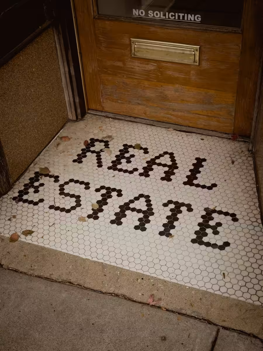 a door with a sign that says real sale on it