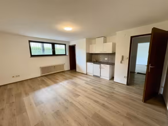 Zimmer mit offener Küche